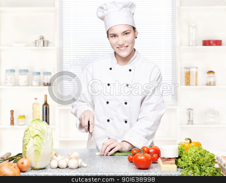 To use this stock image in your creative project, please select the size you need over to the right and click the "Add to Cart" button.
Your downloaded image will come with the Cutcaster watermark removed so don’t worry about the watermark you see on this page. Young chef cutting onions in kitchen stock photo, Young female chef cutting onions in kitchen by iMarin