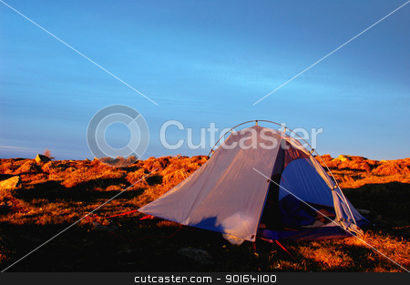 To use this stock image in your creative project, please select the size you need over to the right and click the "Add to Cart" button.
Your downloaded image will come with the Cutcaster watermark removed so don’t worry about the watermark you see on this page. Camping stock photo, Camping on the top of the mountains at sunrise by John Young