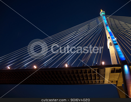 To use this stock image in your creative project, please select the size you need over to the right and click the "Add to Cart" button.
Your downloaded image will come with the Cutcaster watermark removed so don’t worry about the watermark you see on this page. Part of Bhumibol Bridge stock photo, Bhumibol Bridge also casually call as Industrial Ring Road Bridge illuminate with spotlight at night scene, Samut Prakarn,Thailand by Exsodus