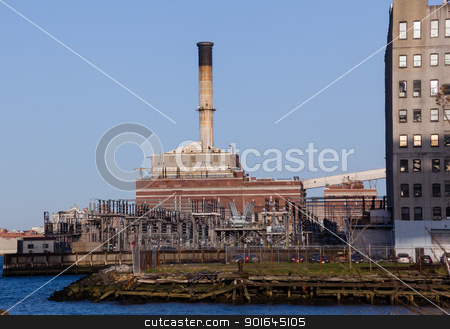To use this stock image in your creative project, please select the size you need over to the right and click the "Add to Cart" button.
Your downloaded image will come with the Cutcaster watermark removed so don’t worry about the watermark you see on this page. Electricity generation station in Brooklyn stock photo, Power station on banks of Hudson river in New York by Steven Heap