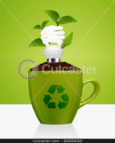 Modern energy saving modern energy saving stock photo, modern energy-saving concept, bright bulb, green mug, green leaves and recycle sign. by Designsstock