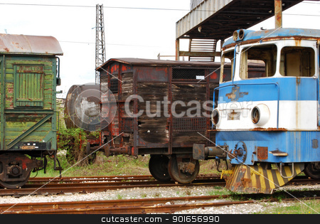 To use this stock image in your creative project, please select the size you need over to the right and click the "Add to Cart" button.
Your downloaded image will come with the Cutcaster watermark removed so don’t worry about the watermark you see on this page. Old railway wagons, rail-motor stock photo, Old railway wooden wagons, vintage rail-motor, cistern by Aleksandar Varbenov