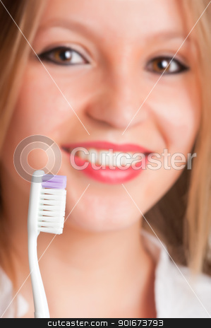 To use this stock image in your creative project, please select the size you need over to the right and click the "Add to Cart" button.
Your downloaded image will come with the Cutcaster watermark removed so don’t worry about the watermark you see on this page. Teeth Brushing stock photo, Closeup of young woman with a tooth brush on her hands, about to brush her teeth by ruigsantos