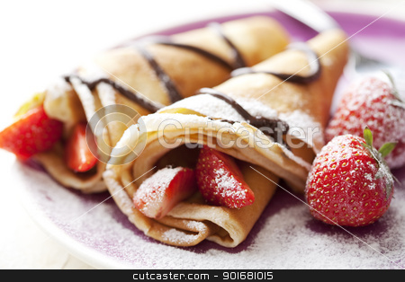 To use this stock image in your creative project, please select the size you need over to the right and click the "Add to Cart" button.
Your downloaded image will come with the Cutcaster watermark removed so don’t worry about the watermark you see on this page. crepes stock photo, close up of two french style crepes, shallow dof. Some ingredients in the background by Liv Friis-Larsen