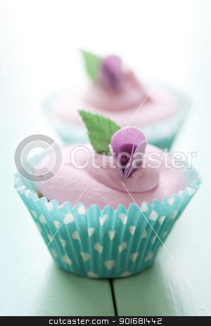 Pastel cupcakes Pastel cupcakes stock photo, closeup of beautiful summer cupcake with strawberry flavoured cream by Liv Friis-Larsen