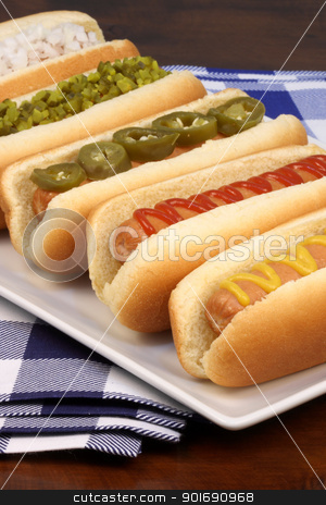 To use this stock image in your creative project, please select the size you need over to the right and click the "Add to Cart" button.
Your downloaded image will come with the Cutcaster watermark removed so don’t worry about the watermark you see on this page. hot dogs stock photo, hot dogs on a nice table setting rich textures colors and flavors by Raul Taborda