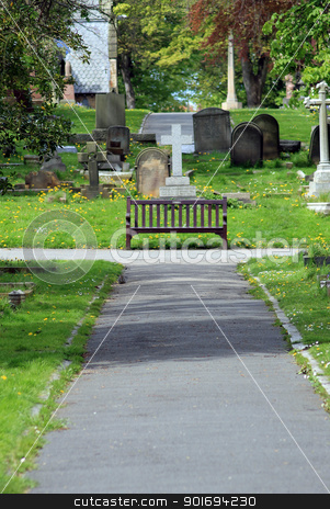 To use this stock image in your creative project, please select the size you need over to the right and click the "Add to Cart" button.
Your downloaded image will come with the Cutcaster watermark removed so don’t worry about the watermark you see on this page. Path and bench in old cemetery stock photo, Path and bench in old cemetery with church and gravestones. by Martin Crowdy