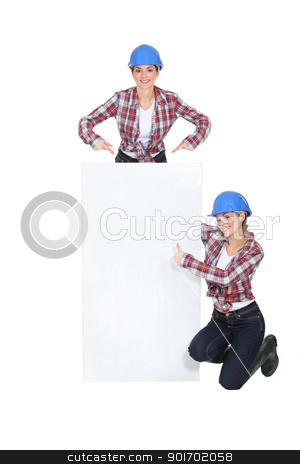To use this stock image in your creative project, please select the size you need over to the right and click the "Add to Cart" button.
Your downloaded image will come with the Cutcaster watermark removed so don’t worry about the watermark you see on this page. Female builder in front of blank poster stock photo, Female builder in front of blank poster by photography33