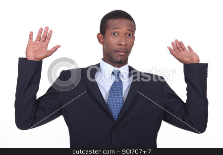 Businessman in a suit holding his hands in the air Businessman in a suit holding his hands in the air stock photo, Businessman in a suit holding his hands in the air by photography33