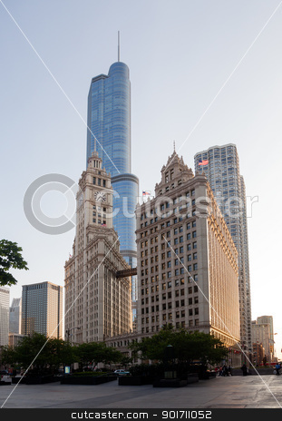 To use this stock image in your creative project, please select the size you need over to the right and click the "Add to Cart" button.
Your downloaded image will come with the Cutcaster watermark removed so don’t worry about the watermark you see on this page. Wrigley building and Trump tower Chicago stock photo, CHICAGO - MAY 14: Trump Tower looms behind Wrigley Building in Chicago on May 14, 2012. Trump Tower tops out at 1389 feet by Steven Heap