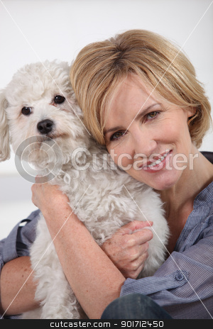 To use this stock image in your creative project, please select the size you need over to the right and click the "Add to Cart" button.
Your downloaded image will come with the Cutcaster watermark removed so don’t worry about the watermark you see on this page. portrait of a woman with dog stock photo, portrait of a woman with dog by photography33