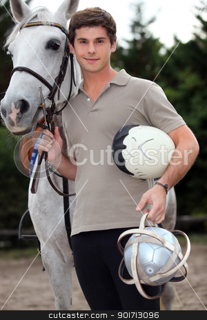 To use this stock image in your creative project, please select the size you need over to the right and click the "Add to Cart" button.
Your downloaded image will come with the Cutcaster watermark removed so don’t worry about the watermark you see on this page. A young horseback rider stock photo, A young horseback rider by photography33