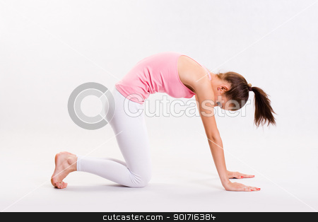 Flexible young yoga girl. Flexible young yoga girl. stock photo, Portrait of a flexible young yoga girl in pink top. by exvivo