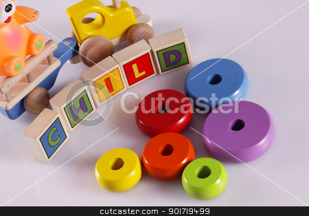 To use this stock image in your creative project, please select the size you need over to the right and click the "Add to Cart" button.
Your downloaded image will come with the Cutcaster watermark removed so don’t worry about the watermark you see on this page. Baby toys! stock photo, Baby toys closeup on table by fikmik