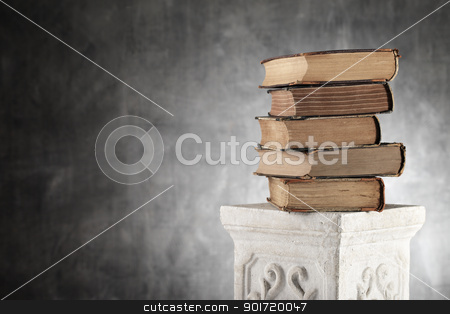 To use this stock image in your creative project, please select the size you need over to the right and click the "Add to Cart" button.
Your downloaded image will come with the Cutcaster watermark removed so don’t worry about the watermark you see on this page. Old Knowledge stock photo, Stack of antique yellowed books on a plaster column. by Stocksnapper