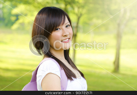 To use this stock image in your creative project, please select the size you need over to the right and click the "Add to Cart" button.
Your downloaded image will come with the Cutcaster watermark removed so don’t worry about the watermark you see on this page. Asian student stock photo, Asian adult student standing outdoor park, green tree background by szefei