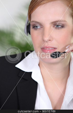 Receptionist with headphones and microphone Receptionist with headphones and microphone stock photo, Receptionist with headphones and microphone by photography33