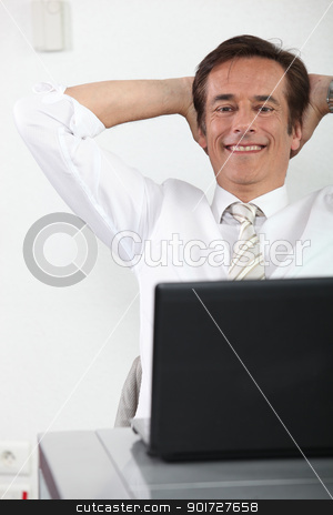 To use this stock image in your creative project, please select the size you need over to the right and click the "Add to Cart" button.
Your downloaded image will come with the Cutcaster watermark removed so don’t worry about the watermark you see on this page. Businessman relaxing at desk stock photo, Businessman relaxing at desk by photography33