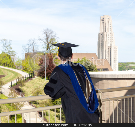 To use this stock image in your creative project, please select the size you need over to the right and click the "Add to Cart" button.
Your downloaded image will come with the Cutcaster watermark removed so don’t worry about the watermark you see on this page. Graduate of UPitt in Pittsburgh stock photo, Doctoral graduate looking toward Cathedral of Learning at University of Pittsburgh by Steven Heap