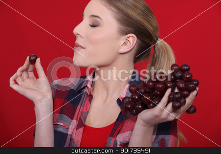 To use this stock image in your creative project, please select the size you need over to the right and click the "Add to Cart" button.
Your downloaded image will come with the Cutcaster watermark removed so don’t worry about the watermark you see on this page. Enjoying fresh grapes. stock photo, Enjoying fresh grapes. by photography33
