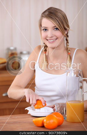 Woman pressing oranges. Woman pressing oranges. stock photo, Woman pressing oranges. by photography33