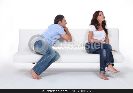 To use this stock image in your creative project, please select the size you need over to the right and click the "Add to Cart" button.
Your downloaded image will come with the Cutcaster watermark removed so don’t worry about the watermark you see on this page. Man apolgising to woman on couch stock photo, Man apolgising to woman on couch by photography33