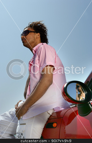 To use this stock image in your creative project, please select the size you need over to the right and click the "Add to Cart" button.
Your downloaded image will come with the Cutcaster watermark removed so don’t worry about the watermark you see on this page. Young man leaning on a convertible car stock photo, Young man leaning on a convertible car by photography33