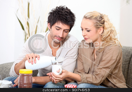 Couple drinking milk Couple drinking milk stock photo, Couple drinking milk by photography33