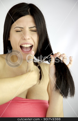 To use this stock image in your creative project, please select the size you need over to the right and click the "Add to Cart" button.
Your downloaded image will come with the Cutcaster watermark removed so don’t worry about the watermark you see on this page. Sensual female model screaming while cutting her long black hair stock photo, Beautiful female model cutting her long hair with sharp scissors scared by federico marsicano
