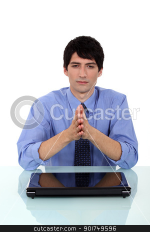 To use this stock image in your creative project, please select the size you need over to the right and click the "Add to Cart" button.
Your downloaded image will come with the Cutcaster watermark removed so don’t worry about the watermark you see on this page. Businessman praying at desk stock photo, Businessman praying at desk by photography33