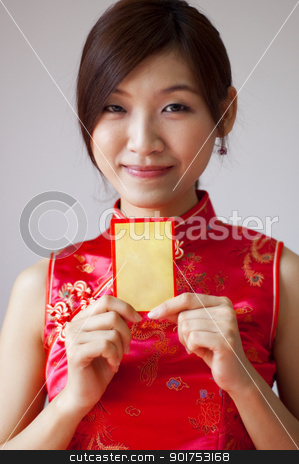 To use this stock image in your creative project, please select the size you need over to the right and click the "Add to Cart" button.
Your downloaded image will come with the Cutcaster watermark removed so don’t worry about the watermark you see on this page. Happy Chinese New Year. stock photo, Oriental girl in cheongsam wear holding a Chinese red packet wishing you happy Chinese New Year. by szefei