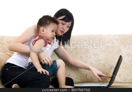 To use this stock image in your creative project, please select the size you need over to the right and click the "Add to Cart" button.
Your downloaded image will come with the Cutcaster watermark removed so don’t worry about the watermark you see on this page. IT education. stock photo, Young mother with her son using a laptop by szefei