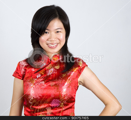 Oriental Woman. Oriental Woman. stock photo, Oriental woman in red Cheongsam. Cheongsam also known in English as a mandarin gown, is formal wear for important occasions. Red is lucky color of Chinese, red cheongsam usually wear by during new year day or wedding. by szefei