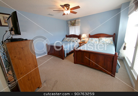 To use this stock image in your creative project, please select the size you need over to the right and click the "Add to Cart" button.
Your downloaded image will come with the Cutcaster watermark removed so don’t worry about the watermark you see on this page. Double Full Bedroom stock photo, Double Full Bedroom, Interior Shot of a Home by Lucy Clark