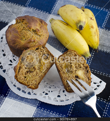 To use this stock image in your creative project, please select the size you need over to the right and click the "Add to Cart" button.
Your downloaded image will come with the Cutcaster watermark removed so don’t worry about the watermark you see on this page. Banana muffins stock photo, Delicious fresh baked banana muffins, with raisins and walnuts, dairy free suitable for vegan by szefei