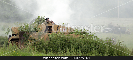 To use this stock image in your creative project, please select the size you need over to the right and click the "Add to Cart" button.
Your downloaded image will come with the Cutcaster watermark removed so don’t worry about the watermark you see on this page. German officer comanding tank stock photo, German officer comands tank ss panzer division by Ollie Taylor