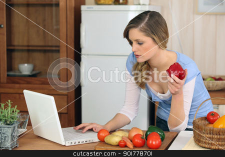 To use this stock image in your creative project, please select the size you need over to the right and click the "Add to Cart" button.
Your downloaded image will come with the Cutcaster watermark removed so don’t worry about the watermark you see on this page. young woman cooking at home stock photo, young woman cooking at home by photography33