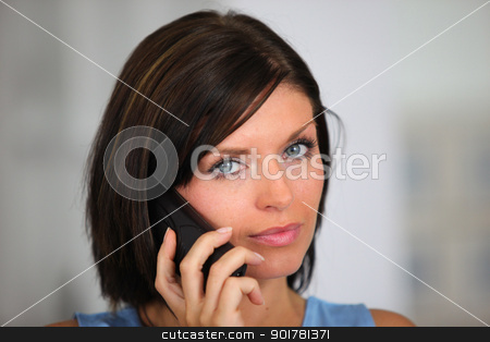 Brunette posing whilst on the telephone Brunette posing whilst on the telephone stock photo, Brunette posing whilst on the telephone by photography33