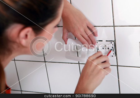 To use this stock image in your creative project, please select the size you need over to the right and click the "Add to Cart" button.
Your downloaded image will come with the Cutcaster watermark removed so don’t worry about the watermark you see on this page. Woman fixing an outlet stock photo, Woman fixing an outlet by photography33
