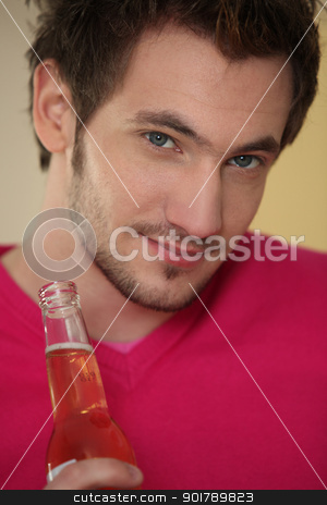 To use this stock image in your creative project, please select the size you need over to the right and click the "Add to Cart" button.
Your downloaded image will come with the Cutcaster watermark removed so don’t worry about the watermark you see on this page. Man with bottle of beer stock photo, Man with bottle of beer by photography33
