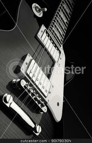 To use this stock image in your creative project, please select the size you need over to the right and click the "Add to Cart" button.
Your downloaded image will come with the Cutcaster watermark removed so don’t worry about the watermark you see on this page. Close up shot of electric guitar stock photo, Close up shot of electric guitar - black and white by foto-fine-art