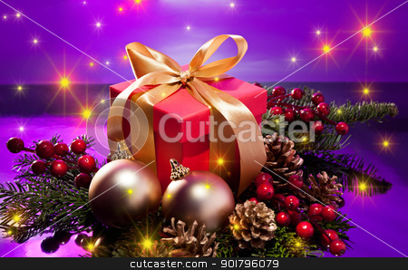 To use this stock image in your creative project, please select the size you need over to the right and click the "Add to Cart" button.
Your downloaded image will come with the Cutcaster watermark removed so don’t worry about the watermark you see on this page. Red present box in a Christmas setting with glowing stars stock photo, Red present box in a Christmas setting with glowing stars over a purple background by Ulrich Schade