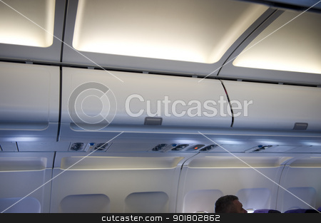 To use this stock image in your creative project, please select the size you need over to the right and click the "Add to Cart" button.
Your downloaded image will come with the Cutcaster watermark removed so don’t worry about the watermark you see on this page. overhead locker aeroplane stock photo, aeroplane locker overhead stowage by Lee Avison