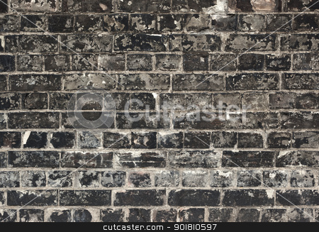 Old weathered black brick wall texture close up. Old weathered black brick wall texture close up. stock photo, Old weathered black brick wall texture close up. by Stephen Rees