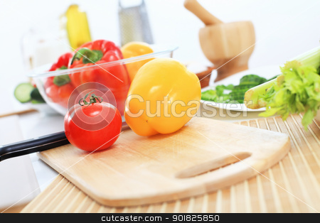 To use this stock image in your creative project, please select the size you need over to the right and click the "Add to Cart" button.
Your downloaded image will come with the Cutcaster watermark removed so don’t worry about the watermark you see on this page. Fresh healthy food stock photo, Fresh food and vegetables on the table by Sergey Nivens