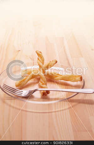 To use this stock image in your creative project, please select the size you need over to the right and click the "Add to Cart" button.
Your downloaded image will come with the Cutcaster watermark removed so don’t worry about the watermark you see on this page. puff pastry sticks stock photo, puff pastry sticks on a glass transparent plate over pine wood table by Francesco Perre