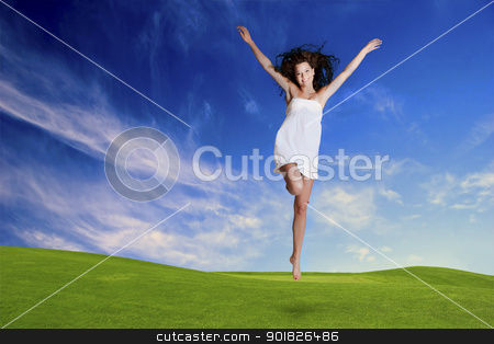 To use this stock image in your creative project, please select the size you need over to the right and click the "Add to Cart" button.
Your downloaded image will come with the Cutcaster watermark removed so don’t worry about the watermark you see on this page. Jumping stock photo, Happy girl jumping in a beautiful green meadow by ikostudio