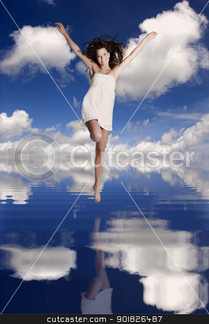 To use this stock image in your creative project, please select the size you need over to the right and click the "Add to Cart" button.
Your downloaded image will come with the Cutcaster watermark removed so don’t worry about the watermark you see on this page. Girl jumping over the water stock photo, Beautiful and happy girl jumping over the water with her reflection by ikostudio