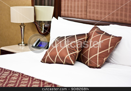 To use this stock image in your creative project, please select the size you need over to the right and click the "Add to Cart" button.
Your downloaded image will come with the Cutcaster watermark removed so don’t worry about the watermark you see on this page. Pillows in Hotel bedroom stock photo, Concept for luxury and Honeymoon, pillows in a luxury hotel by Perseomedusa
