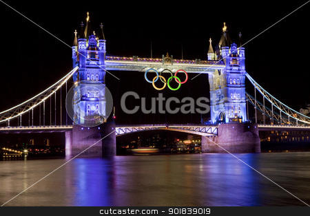To use this stock image in your creative project, please select the size you need over to the right and click the "Add to Cart" button.
Your downloaded image will come with the Cutcaster watermark removed so don’t worry about the watermark you see on this page. Tower Bridge and Olympic Rings stock photo, Tower Bridge during the London 2012 Olympic Games. by Chris Dorney